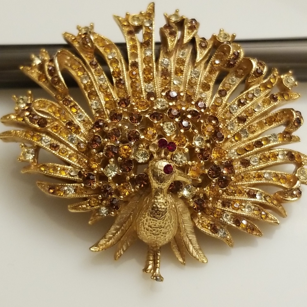 Vintage peacock jeweled pin Brooch Goldtone